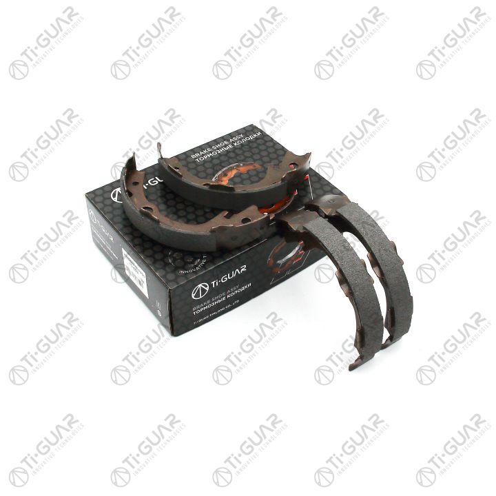 Тормозные колодки (РУЧНОГО ТОРМОЗА) TG-4299/FN0614* Ti·GUAR (комплект 4шт.) Тормозные колодки (РУЧНОГО ТОРМОЗА) TG-4299/FN0614* Ti·GUAR (комплект 4шт.)